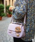 Pompom whisper chic