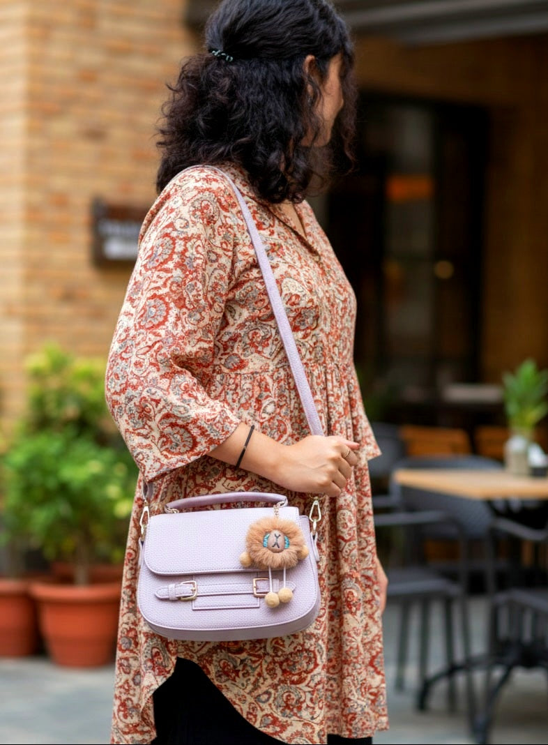 Pompom whisper chic